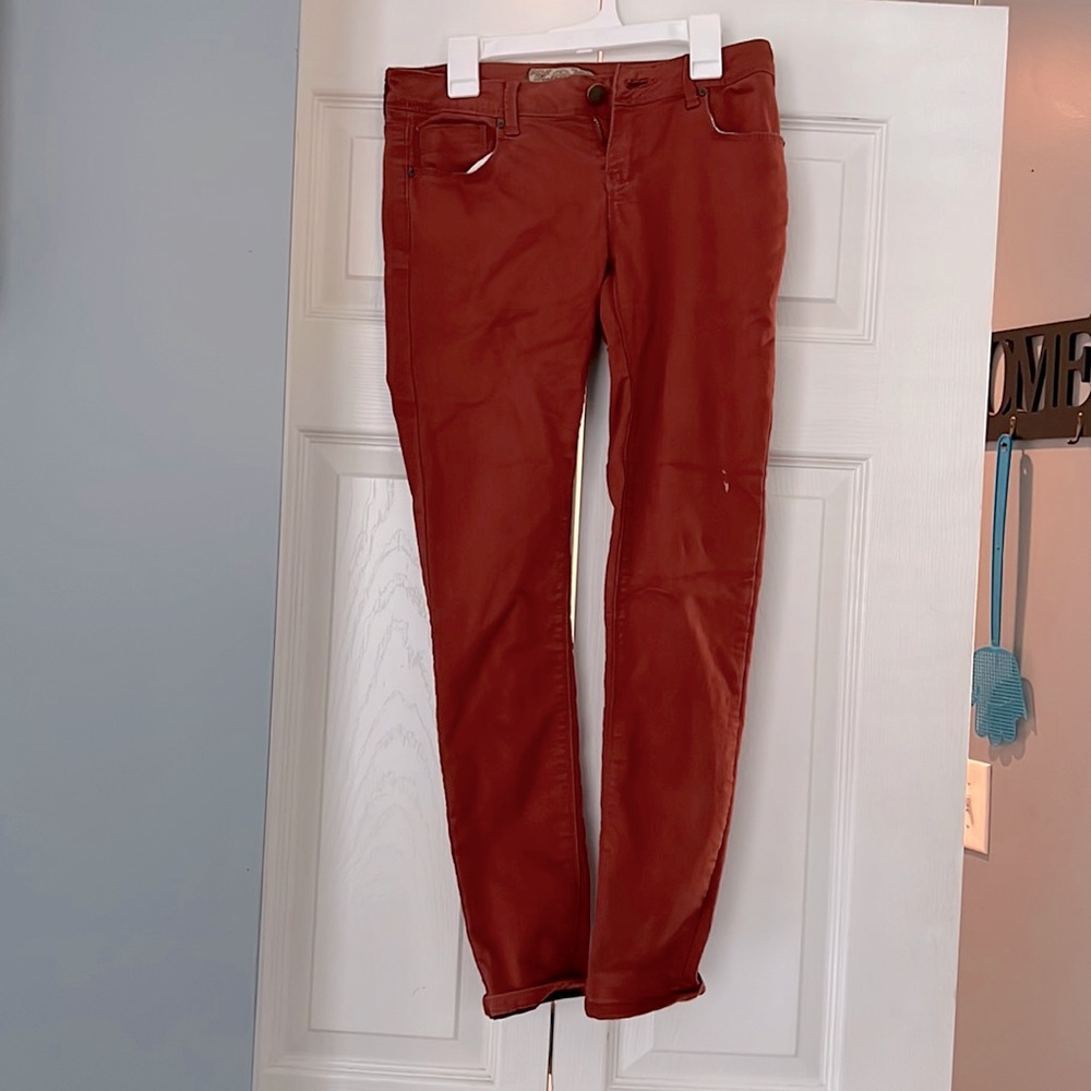 Dark orange jeans